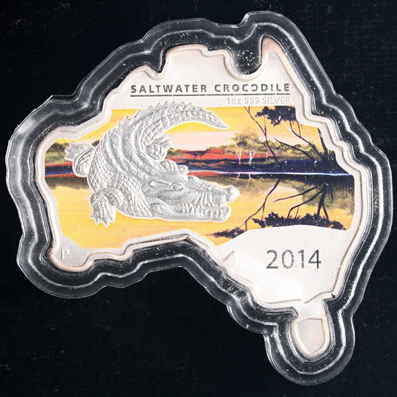 2014 Australia 1oz Silver Crocodile Map Coin OGP COA: 2014 Australia 1oz Silver Crocodile Map Coin OGP COA This stunning 2014 Australia 1 Ounce Silver $1 coin features a unique map-shaped design of a crocodile, showcasing exceptional eye appeal and luste