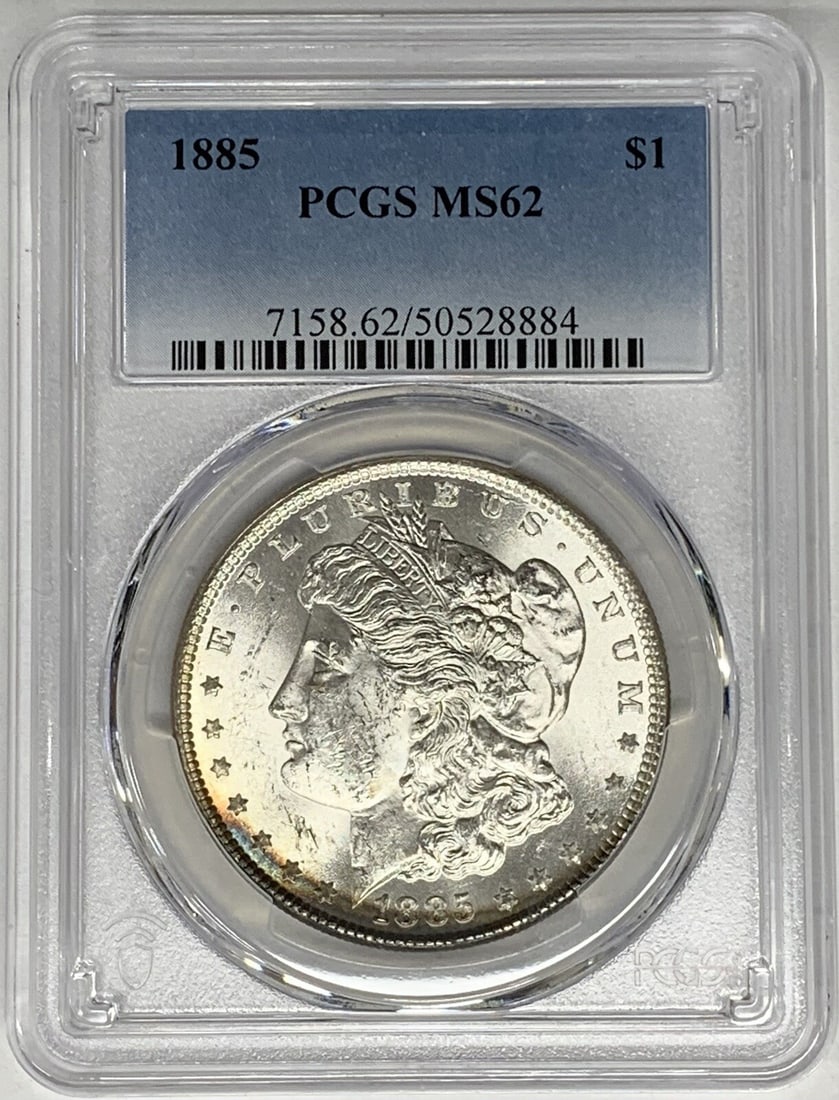 PCGS MS62 1885 United States Morgan Silver Dollar Uncirculated: PCGS MS62 1885 United States Morgan Silver Dollar Uncirculated This 1885 Morgan Silver Dollar is certified by PCGS with a grade of MS 62, indicating it is in uncirculated condition. Struck in silver, 