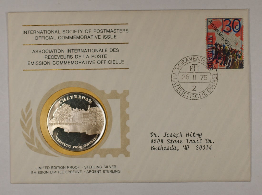 Amsterdam 700th Anniversary Silver Medal 1975 in First Day Cover: Amsterdam 700th Anniversary Silver Medal 1975 in First Day Cover This 1975 International Society of Postmasters commemorative medal was struck in 0.925 fine sterling silver by the Franklin Mint to mar