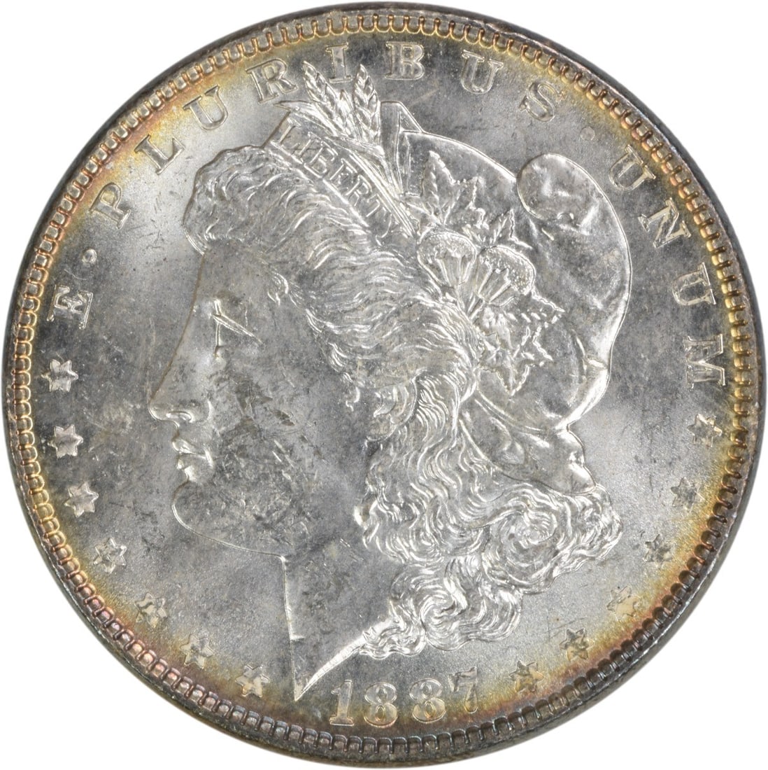 1887 BU Morgan Dollar Silver Coin Uncirculated Philadelphia No Mint Mark: 1887 BU Morgan Dollar Silver Coin Uncirculated Philadelphia No Mint Mark This is an 1887 Morgan Silver Dollar from the United States. The coin is uncirculated and in Brilliant Uncirculated (BU) condit