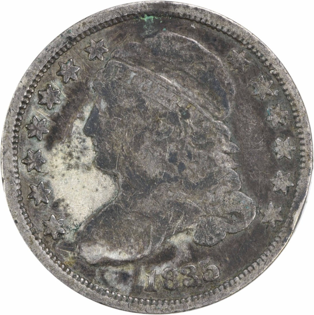 1835 Capped Bust Silver Dime 10C Uncertified Philadelphia Mint: 1835 Capped Bust Silver Dime 10C Uncertified Philadelphia Mint This 1835 Capped Bust Silver Dime is a notable piece for collectors, featuring a design by John Reich. The coin has a circulated grade of
