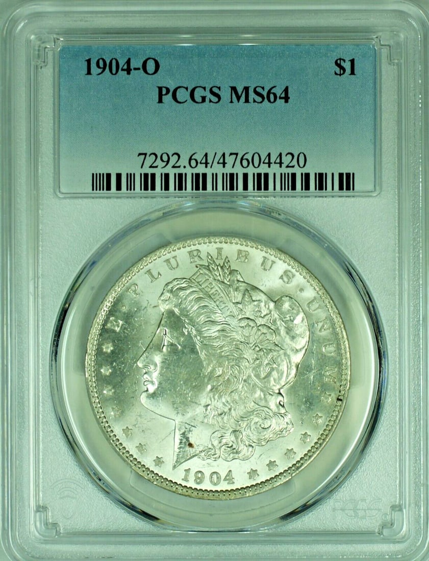 PCGS MS 64 1904-O Morgan Silver Dollar United States $1 Coin: PCGS MS 64 1904-O Morgan Silver Dollar United States $1 Coin This is a 1904-O Morgan Silver Dollar $1 coin, certified by PCGS with a grade of MS 64. The coin is uncirculated and composed of silver. It