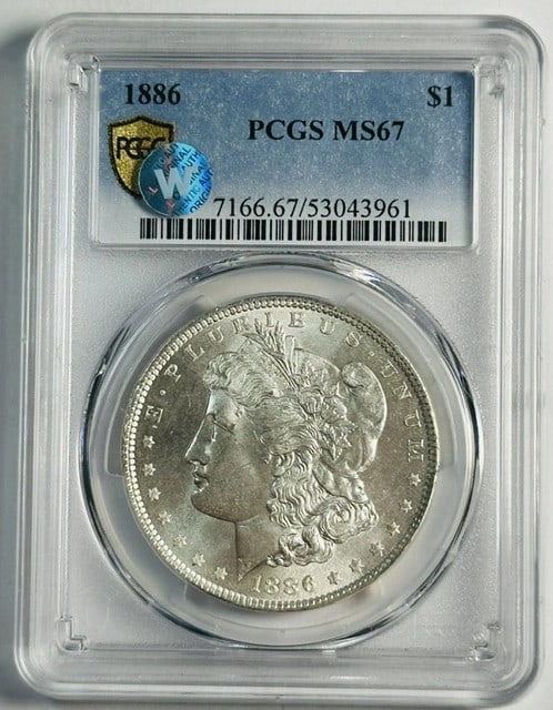 PCGS Graded 1886 Philadelphia Morgan Silver Dollar MS67 Uncirculated: PCGS Graded 1886 Philadelphia Morgan Silver Dollar MS67 Uncirculated This is an 1886 Morgan Silver Dollar graded MS-67 by PCGS. The coin is struck in silver and remains uncirculated, originating from 