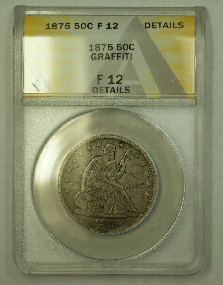 1875 Silver 50 Cent Coin Graded F-12 by ANACS With Graffiti: 1875 Silver 50 Cent Coin Graded F-12 by ANACS With Graffiti This is a pre-owned 1875 Seated Half Dollar coin from the United States, certified by ANACS with a grade of F-12 Details. The coin was minte