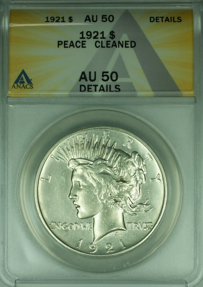 1921 ANACS AU 50 Peace Dollar Silver Coin Cleaned Philadelphia Mint: 1921 ANACS AU 50 Peace Dollar Silver Coin Cleaned Philadelphia Mint This is a 1921 Peace Silver Dollar coin certified by ANACS with a grade of AU-50 Details, noting it has been cleaned. Minted in Phil