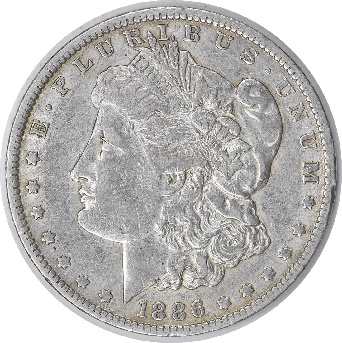 1886-O Morgan Silver Dollar 90% Silver XF George T. Morgan: 1886-O Morgan Silver Dollar 90% Silver XF George T. Morgan This 1886-O Morgan Silver Dollar is a beautiful piece with a rich history. It features a design by George T. Morgan and was minted in New Orl