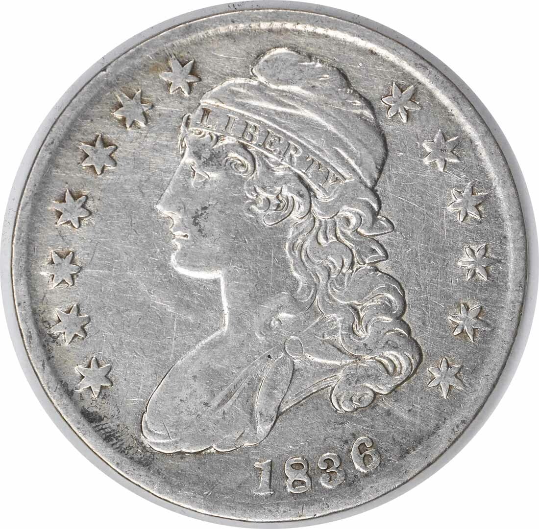1836 Bust Silver Half Dollar Lettered Edge Circulated 50C: 1836 Bust Silver Half Dollar Lettered Edge Circulated 50C This 1836 Bust Silver Half Dollar is a classic piece of American numismatics, featuring a stunning design by Christian Gobrecht. The coin has 