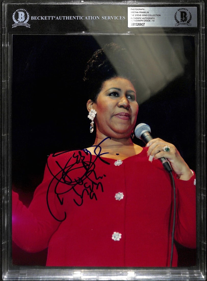 Aretha Franklin Signed 8x10 Photograph Beckett Graded Autograph 10: Aretha Franklin Signed 8x10 Photograph Beckett Graded Autograph 10 This is an original 8x10 photograph signed in blue permanent marker by renowned singer Aretha Franklin. The autograph was obtained in