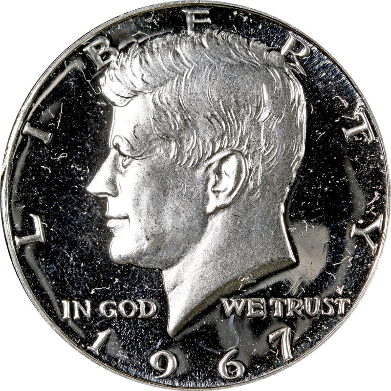 1967 Kennedy Half Dollar Black and White Cameo Special Mint Set: 1967 Kennedy Half Dollar Black and White Cameo Special Mint Set This 1967 Kennedy Half Dollar features a distinctive black and white cameo appearance and belongs to the Special Mint Set (SMS). The coi