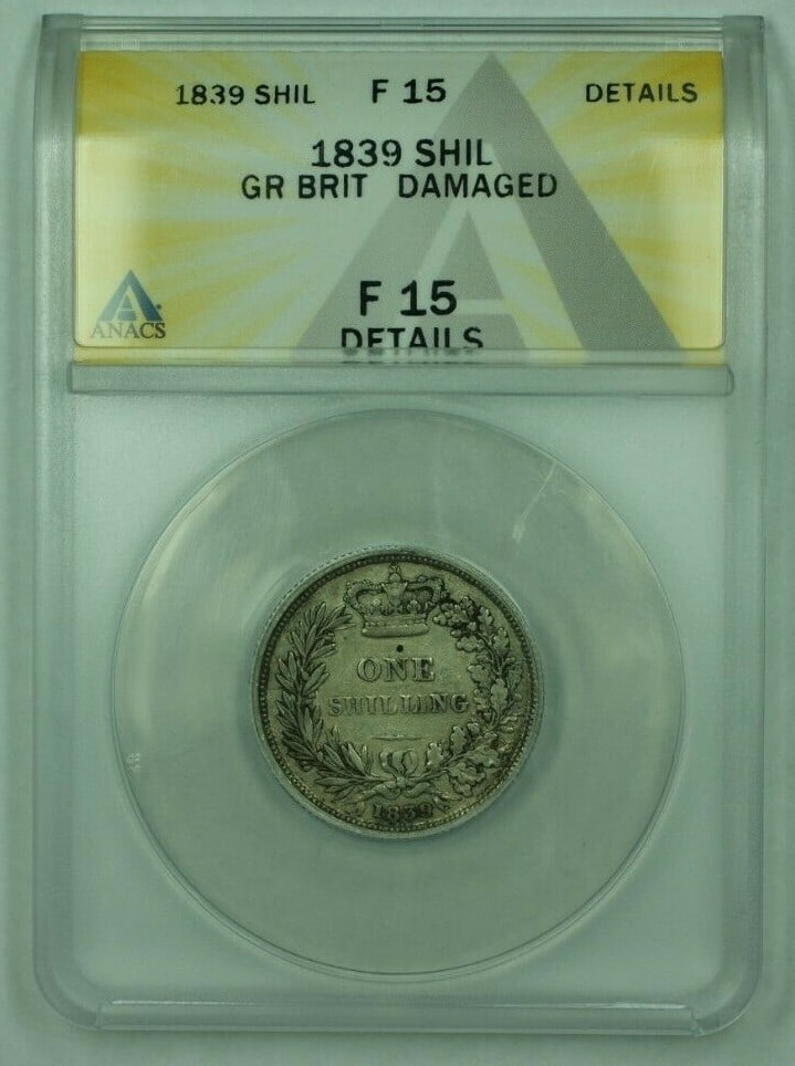 1839 United Kingdom Silver 1 Shilling Coin ANACS F-15 Damaged: 1839 United Kingdom Silver 1 Shilling Coin ANACS F-15 Damaged This is an 1839 Great Britain 1 Shilling coin, certified by ANACS with a grade of F-15 Details and noted as damaged. The coin is composed 