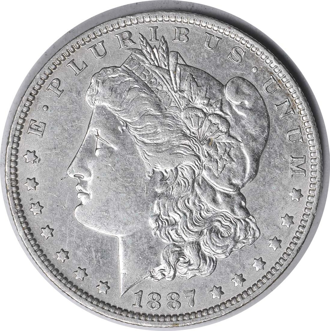 1887 Morgan Silver Dollar New Orleans Mint O Mint Mark XF: 1887 Morgan Silver Dollar New Orleans Mint O Mint Mark XF The 1887/6-O VAM 3 Morgan Silver Dollar is a notable piece featuring the distinguished design by George T. Morgan. This coin is made of 90% si