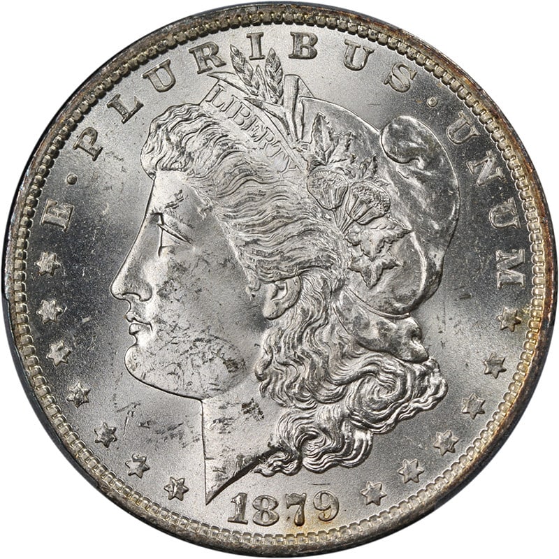 1879-O Morgan Silver Dollar PCGS MS64 Superb Eye Appeal: 1879-O Morgan Silver Dollar PCGS MS64 Superb Eye Appeal This stunning 1879-O Morgan Silver Dollar is graded PCGS MS64, showcasing superb eye appeal with fantastic luster and a strong strike. The coin 