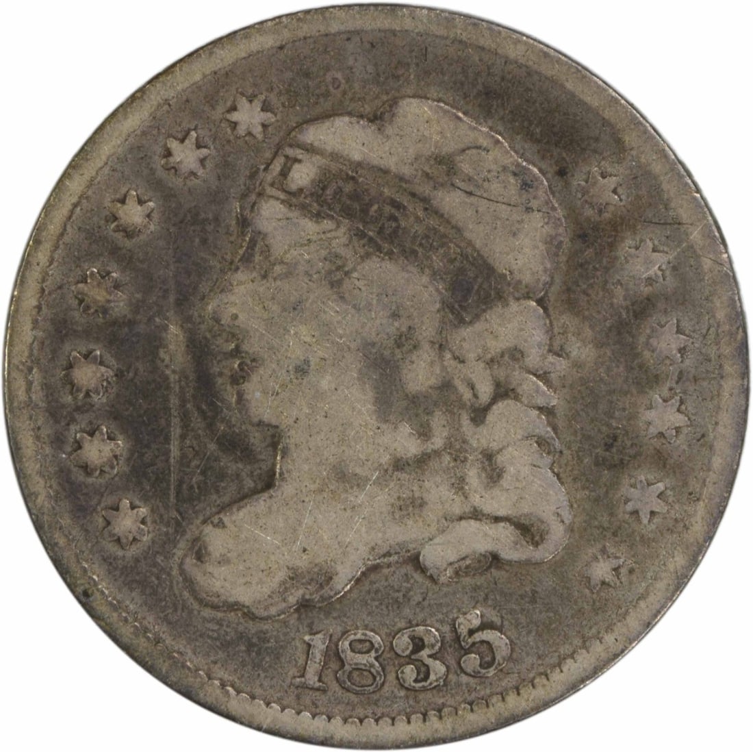 1835 Capped Bust Silver Half Dime Uncertified 15.90mm USA: 1835 Capped Bust Silver Half Dime Uncertified 15.90mm USA This 1835 Capped Bust Silver Half Dime is a remarkable piece of American coinage, showcasing the craftsmanship of its era. The coin, minted in