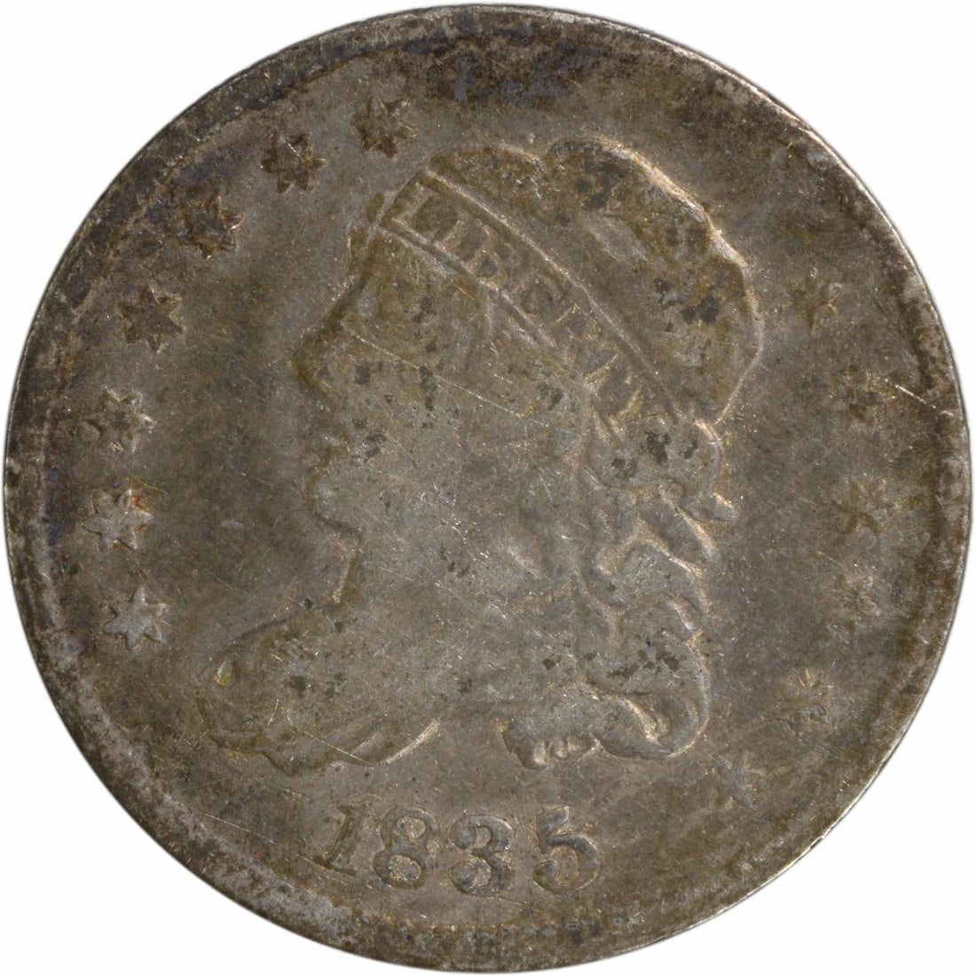 1835 Capped Bust Half Dime Uncertified 89.2% Silver: 1835 Capped Bust Half Dime Uncertified 89.2% Silver This 1835 Capped Bust Silver Half Dime is a remarkable piece of American numismatic history. It features a classic design by William Kneass and was 