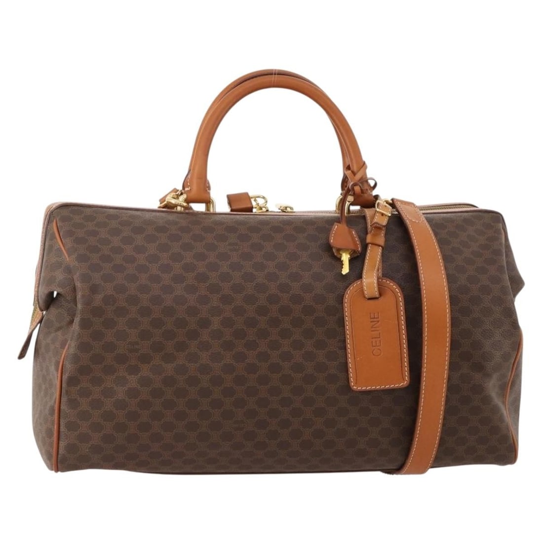 CELINE Macadam Canvas Brown Gold Boston Bag with Strap Padlock Key: CELINE Macadam Canvas Brown Gold Boston Bag with Strap Padlock Key This CELINE Boston Bag features the iconic Macadam canvas combined with PVC leather in a brown and gold colorway. Designed as a versa