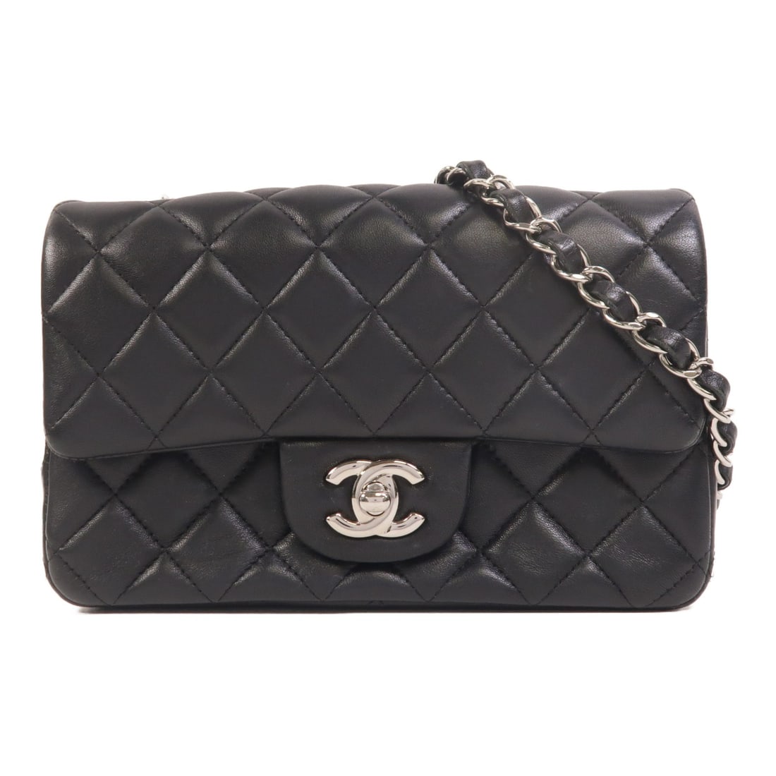 Chanel Mini Classic 20 Lambskin Black Shoulder Bag: Chanel Mini Classic 20 Lambskin Black Shoulder Bag This CHANEL Mini Classic 20 chain shoulder bag is crafted from luxurious black lambskin leather. Featuring the iconic CC logo with silver-tone hardwa