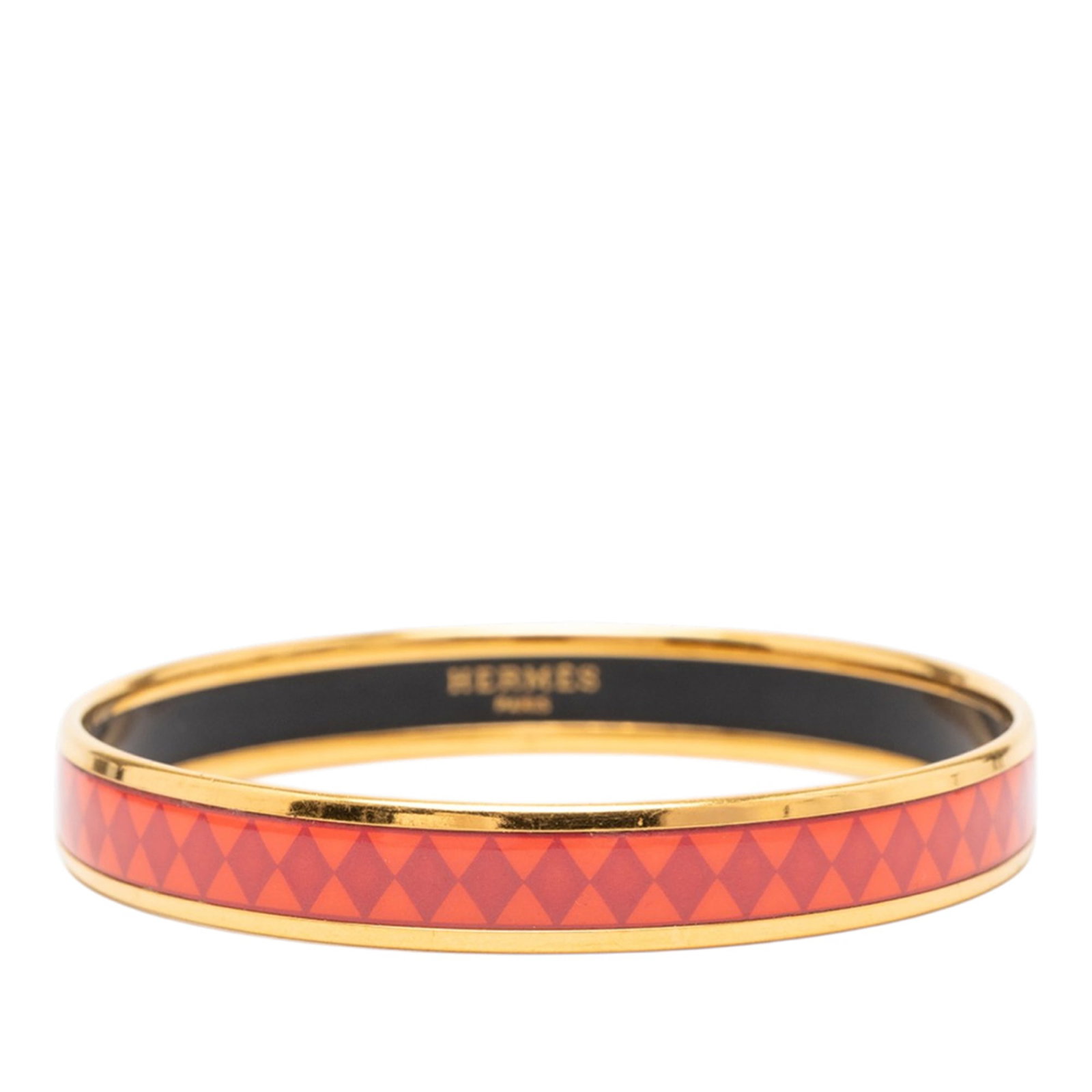 Hermes Orange Enamel Bracelet with Diamond Pattern Gold Plated 62: Hermes Orange Enamel Bracelet with Diamond Pattern Gold Plated 62 This Hermes Narrow Diamond Motif Enamel Bangle 62 features an orange diamond motif print on enamel, complemented by a gold-plated body