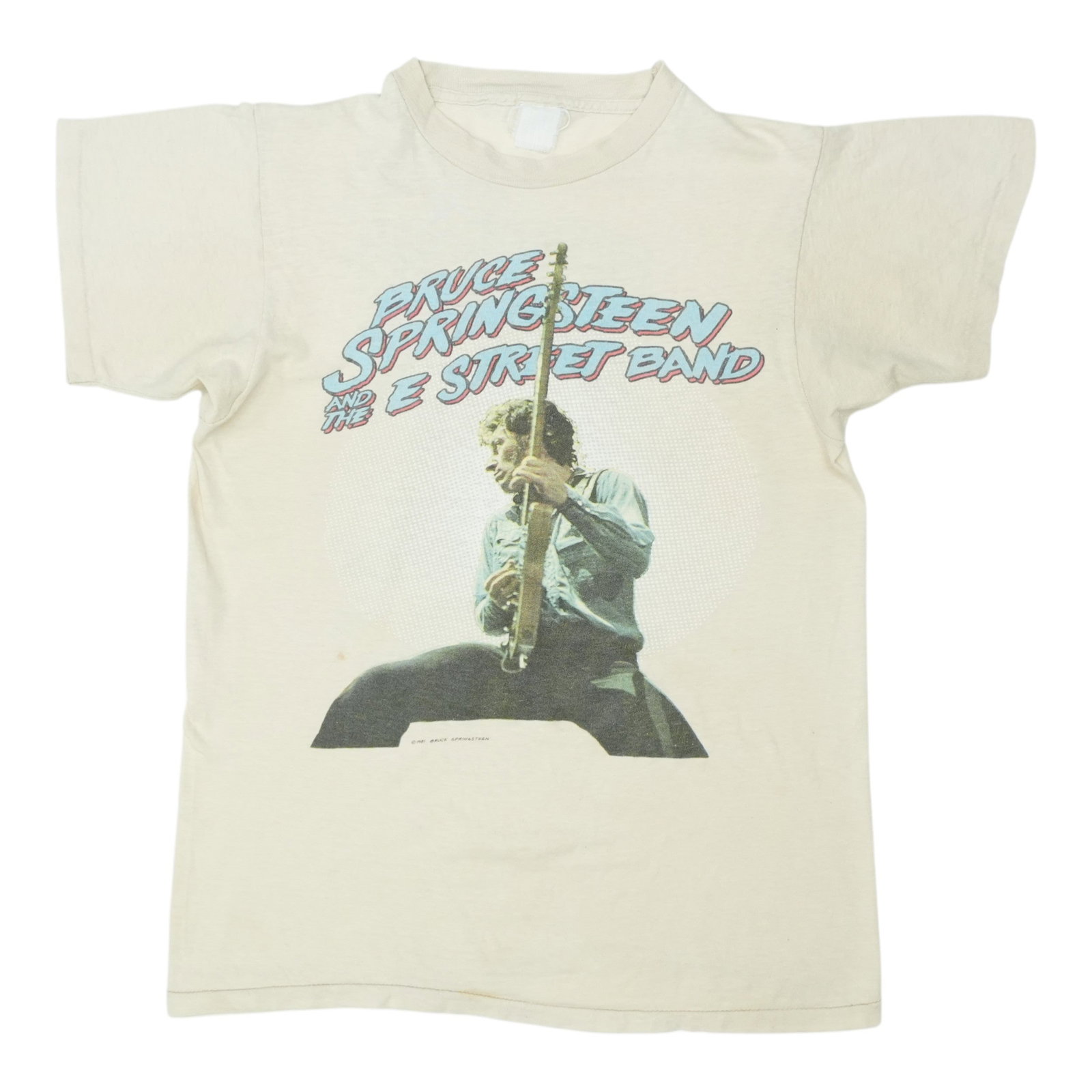 Vintage 1981 Bruce Springsteen Concert Tee Tan Cotton: Vintage 1981 Bruce Springsteen Concert Tee Tan Cotton This original vintage 1981 Bruce Springsteen Spectrum Concert Shirt features front and back graphics and is made of 100% cotton. The shirt is in g