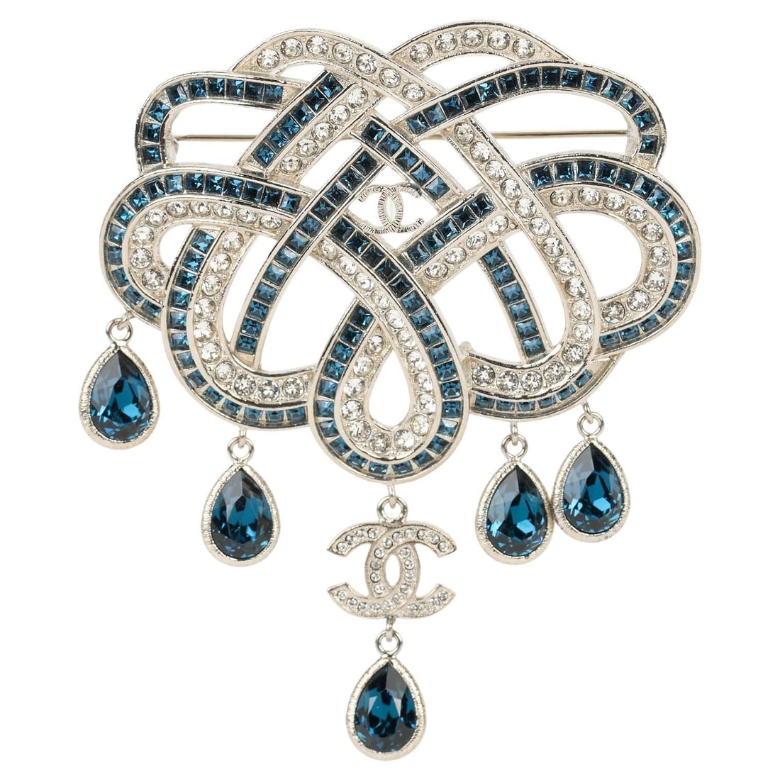 Chanel K 2017 Oversize Sapphire & Crystal Brooch: Chanel K 2017 Oversize Sapphire & Crystal Brooch This exquisite Chanel Sapphire & Crystal Drops Brooch features a stunning combination of crystals and sapphires set in a silver tone metal. Crafted in 