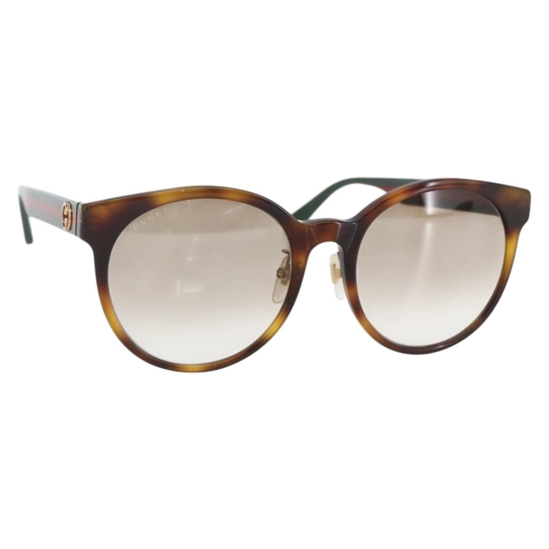 Green GUCCI GG0416SK Plastic Sunglasses with Case: Green GUCCI GG0416SK Plastic Sunglasses with Case These GUCCI GG0416SK sunglasses feature a green plastic frame and are crafted in Italy. The sunglasses come with a dust bag and a sunglass case. They 