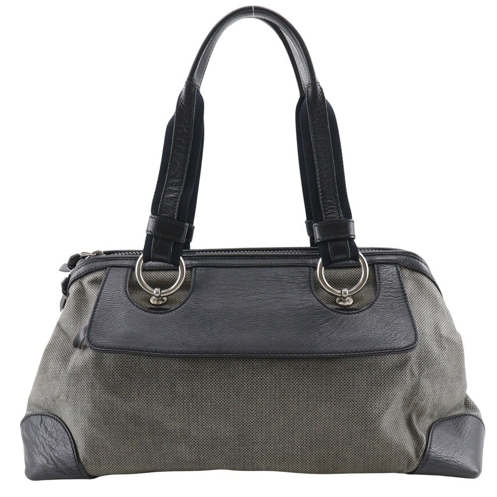 Gray Canvas Bottega Veneta Vintage Women's Handbag 37cm: Gray Canvas Bottega Veneta Vintage Women's Handbag 37cm This Bottega Veneta vintage handbag features a gray canvas exterior with leather accents. Designed for women, it offers a spacious interior and 