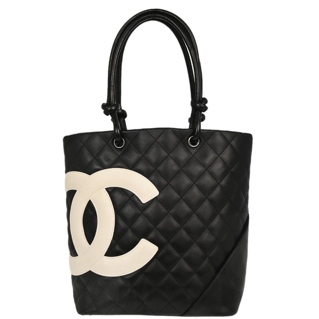 Chanel Cambon Ligne Quilted Black Calfskin Tote Bag with Silver Hardware: Chanel Cambon Ligne Quilted Black Calfskin Tote Bag with Silver Hardware This Chanel Cambon Ligne tote handbag is crafted from black quilted calfskin leather with signature logo accents. It features d