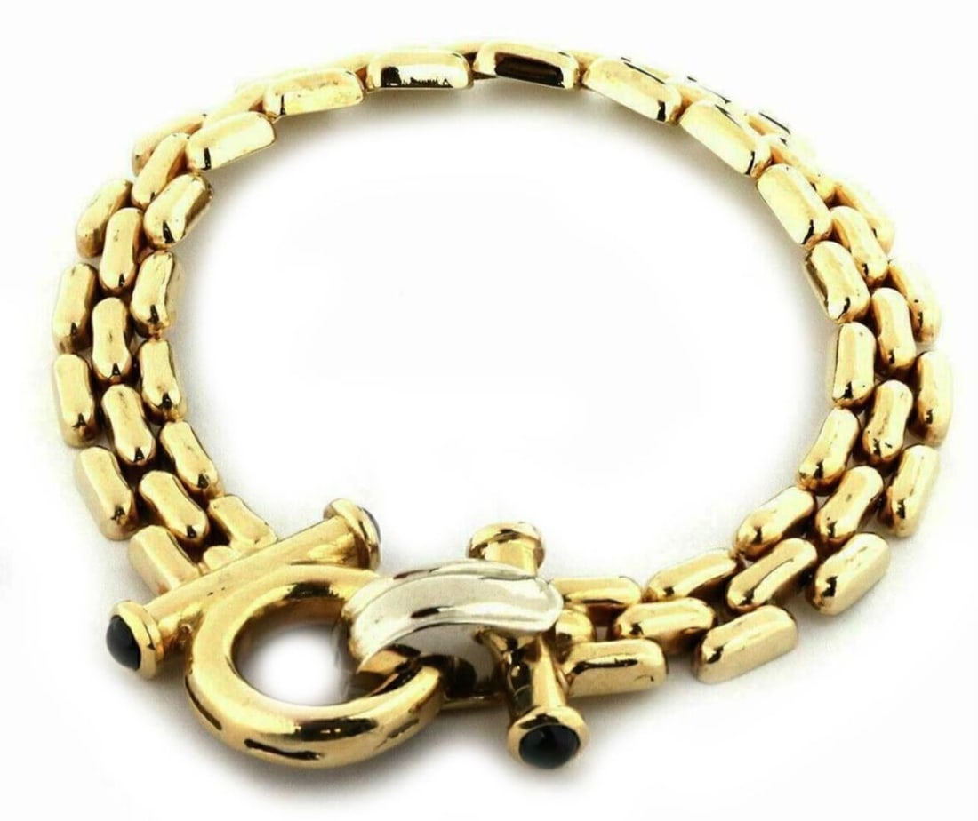 Vintage sapphire bar link bracelet 14k yellow gold 7.75: Vintage sapphire bar link bracelet 14k yellow gold 7.75 This vintage link bracelet showcases three rows of sapphires set in a distinctive bar link design. Crafted from 14k yellow and white gold, the b