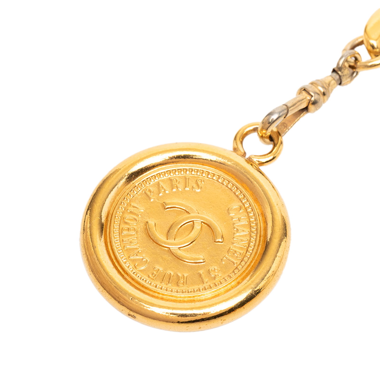 Chanel 31 Rue Cambon Medallion Gold Plated Chain Belt Accessory: Chanel 31 Rue Cambon Medallion Gold Plated Chain Belt Accessory This Chanel belt features a gold plated metal body adorned with medallion charms and is secured with a hook closure. The stylish accesso