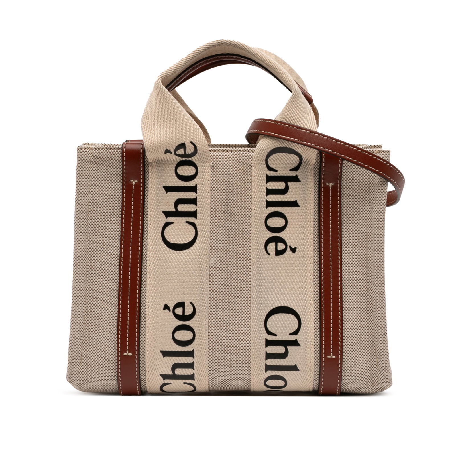 Chloe Woody Small Beige Canvas Satchel with Leather Trim and Strap: Chloe Woody Small Beige Canvas Satchel with Leather Trim and Strap This small satchel features a beige canvas body with flat canvas handles accented by leather details, a detachable flat leather strap