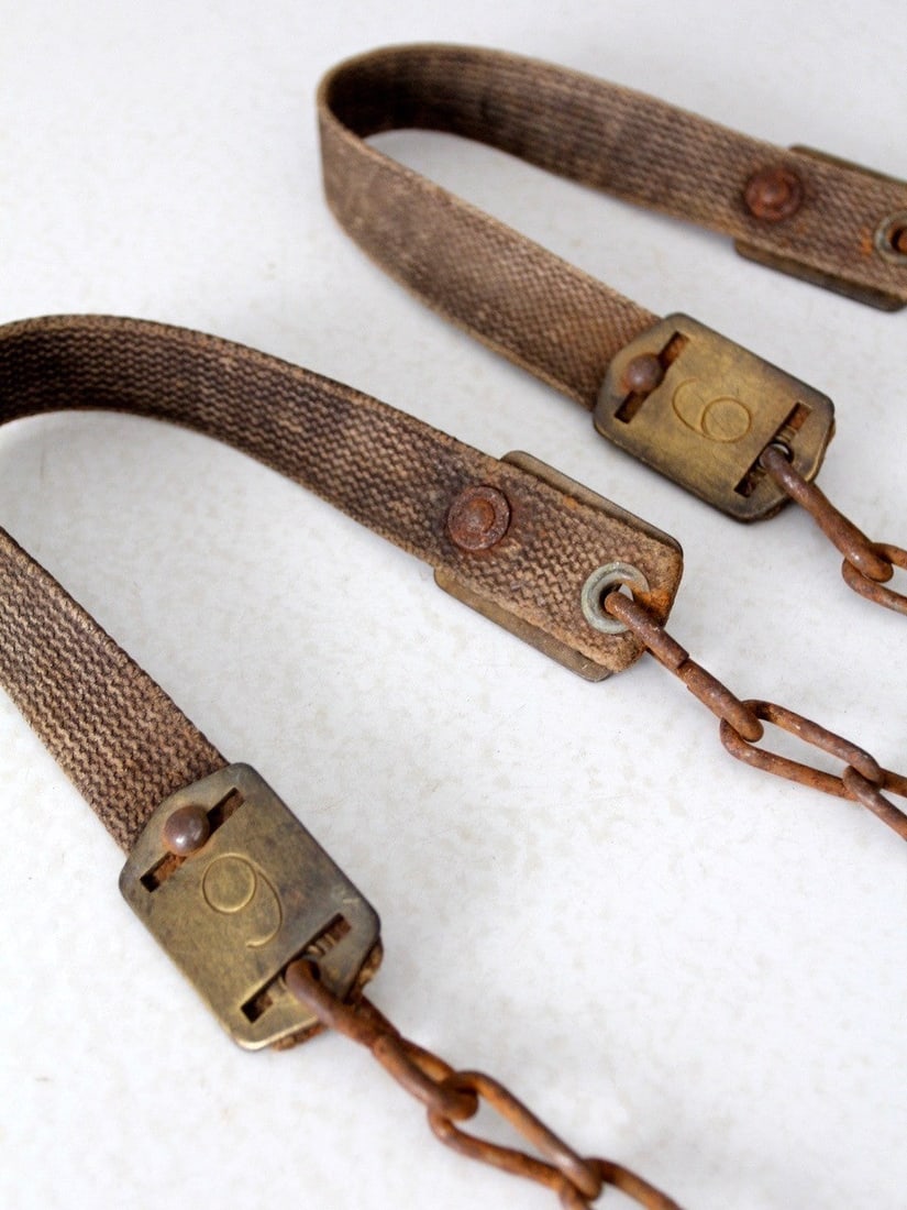 Vintage Canvas Straps with Brass Numbers 6 and 9: Vintage Canvas Straps with Brass Numbers 6 and 9 Enhance your vintage collection with this unique pair of straps featuring rustic chains and distinctive brass numbers. These canvas straps showcase a c