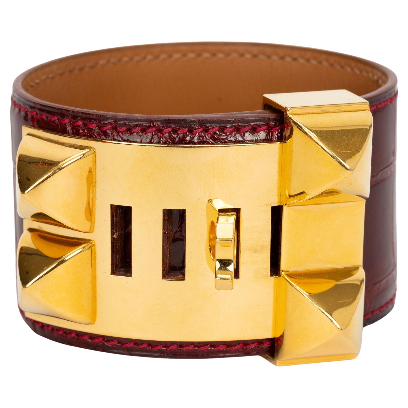 Hermes Collier De Chien Burgundy Red Alligator 2004 with Box: Hermes Collier De Chien Burgundy Red Alligator 2004 with Box This exquisite Hermes Collier De Chien is crafted from luxurious burgundy red alligator leather, complemented by gold tone hardware. The pi