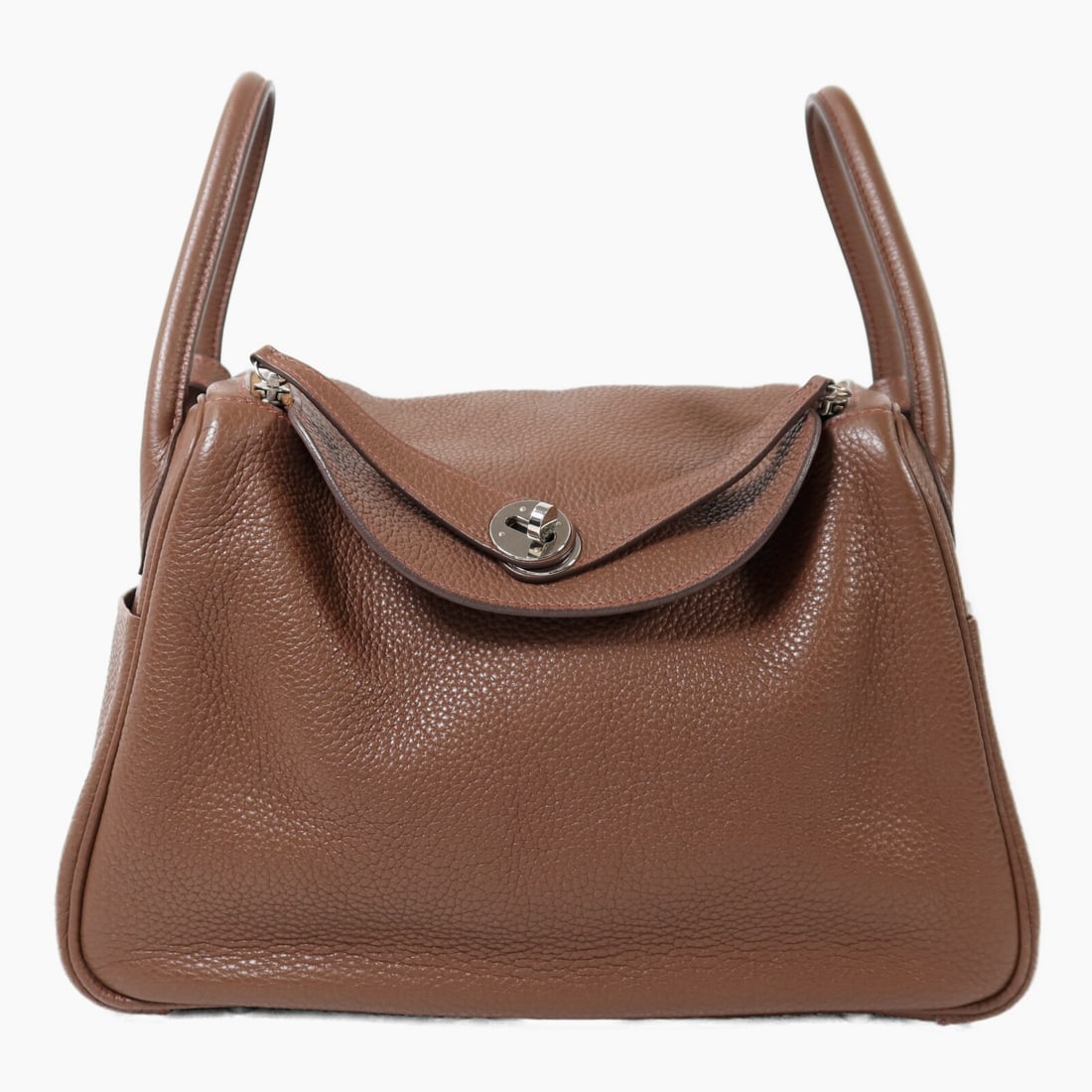Hermes Lindy 30 Brown Clemence Leather Shoulder Bag with Palladium Hardware: Hermes Lindy 30 Brown Clemence Leather Shoulder Bag with Palladium Hardware This Hermes Lindy 30 shoulder bag is crafted from Taurillon Clemence calfskin leather in a brown shade known as Havane with 