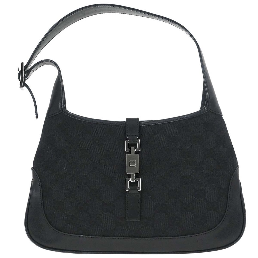 Gucci Jackie black GG canvas leather handbag: Gucci Jackie black GG canvas leather handbag This vintage Gucci Jackie handbag features the iconic GG pattern in black canvas leather. With a medium size, it offers a stylish and classic look, complem