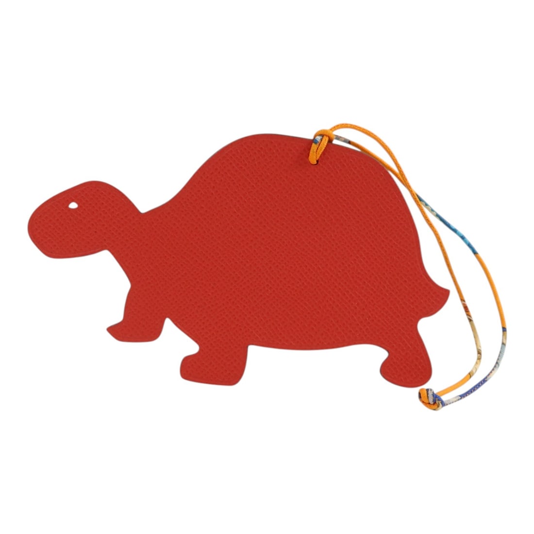 Turtle PM Bag Charm in Red and Purple Epsom and Swift Leather: Turtle PM Bag Charm in Red and Purple Epsom and Swift Leather This Hermes Turtle PM charm is crafted from Epsom and Swift calfskin leather in a red and purple color combination. Designed for women, it