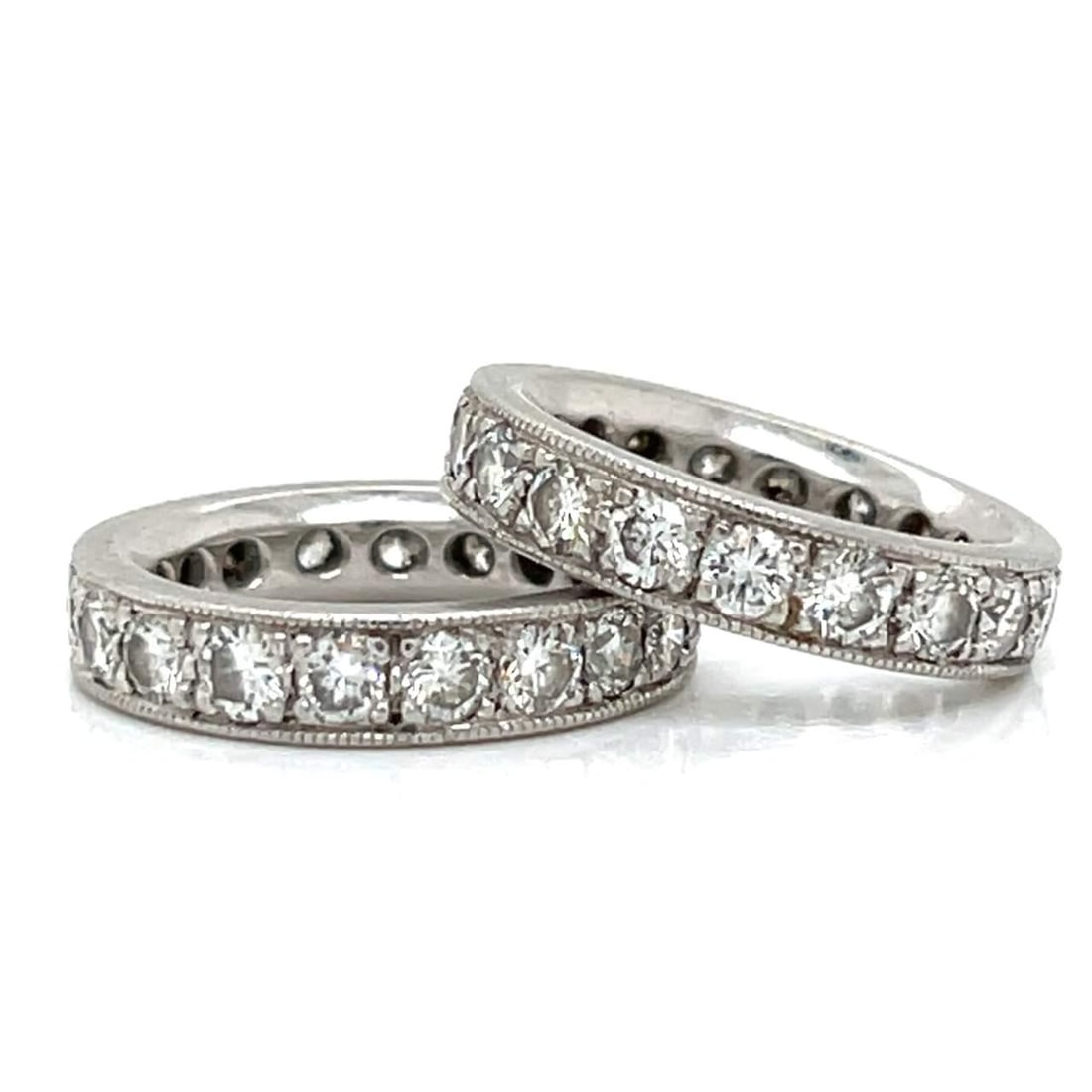 Platinum Eternity Ring Set with 40 Diamonds 4.50 Ct F-G VVS-VS: Platinum Eternity Ring Set with 40 Diamonds 4.50 Ct F-G VVS-VS This exquisite Platinum 2 Diamond Eternity Ring Set features a total of 40 sparkling diamonds with an approximate total weight of 4.50 Ct