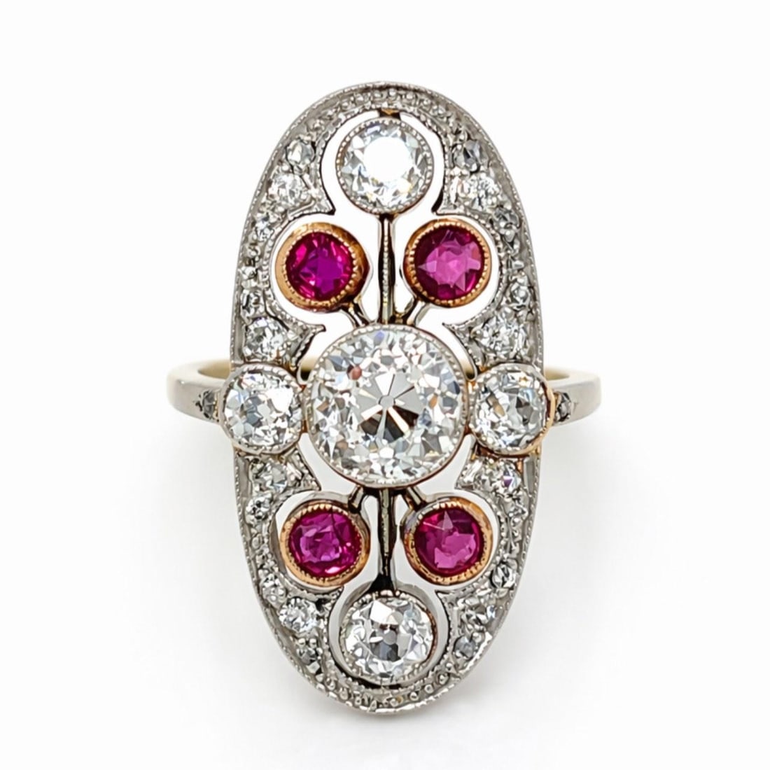 Burma Ruby and Diamond Victorian Ring in 18K Yellow Gold with Platinum Top: Burma Ruby and Diamond Victorian Ring in 18K Yellow Gold with Platinum Top This Victorian ring features an 18K yellow gold band with a platinum top. The centerpiece is an approximately 1.25 carat Euro