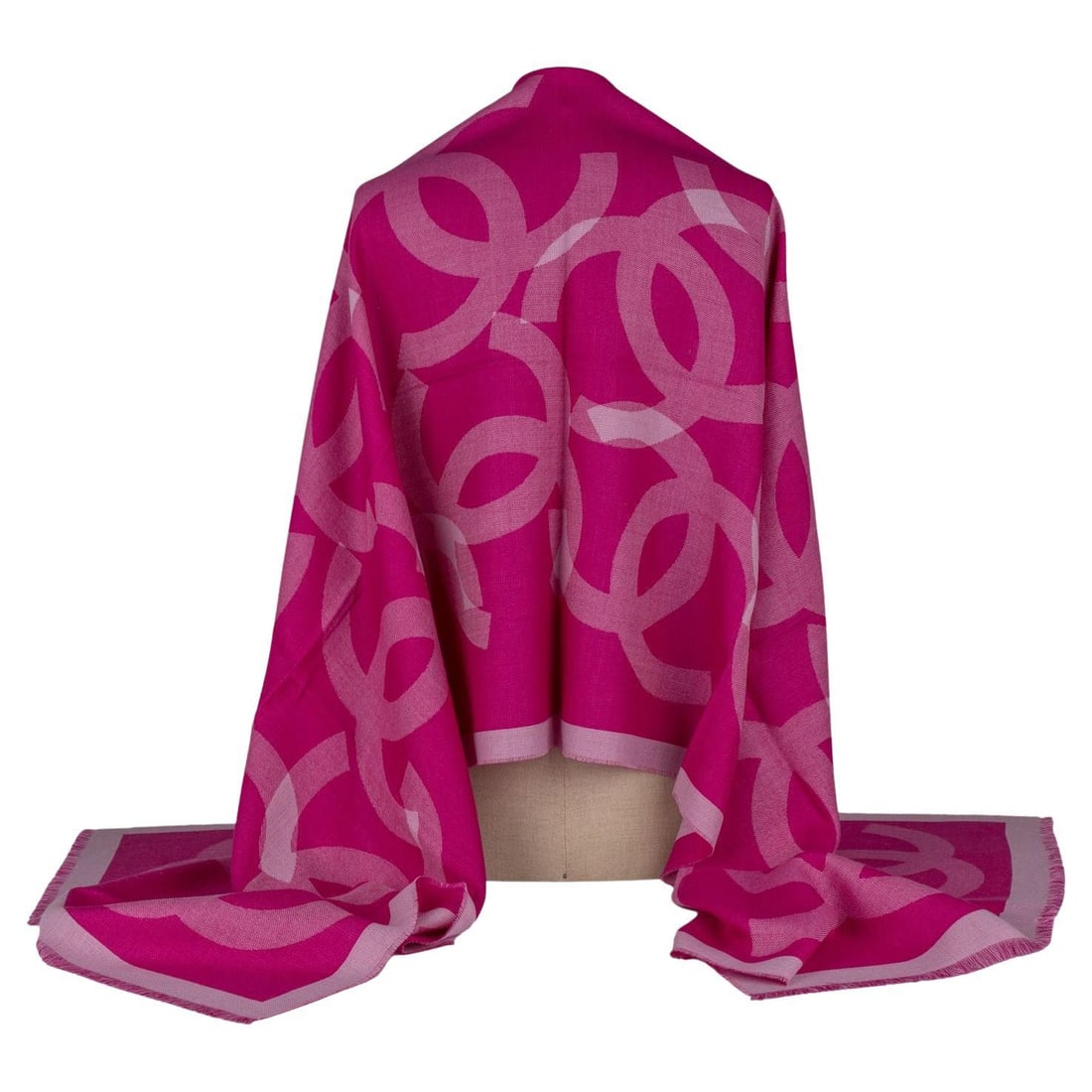 Chanel Cashmere Shawl Fuchsia with CC Logos 27 x 80 Inches: Chanel Cashmere Shawl Fuchsia with CC Logos 27 x 80 Inches This exquisite Chanel Cashmere Shawl in vibrant fuchsia showcases an elegant design featuring large overlapping CC logos. Crafted in Italy, t