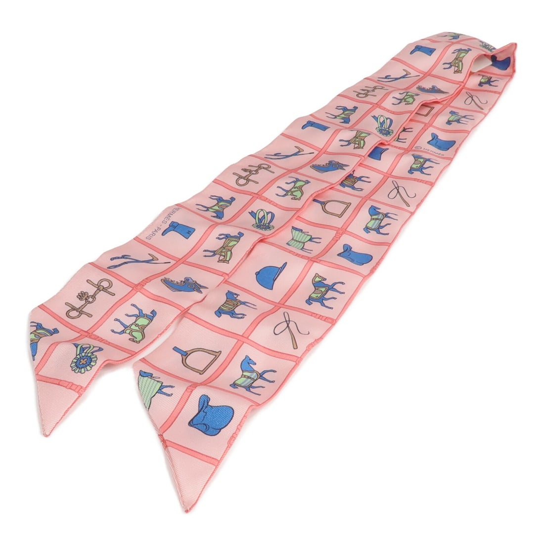 Hermes Twilly Pink Silk Neck Scarf: Hermes Twilly Pink Silk Neck Scarf This Hermes Twilly scarf is crafted from luxurious silk in a vibrant pink hue. Designed for women, it offers a versatile accessory option that can be styled in vario