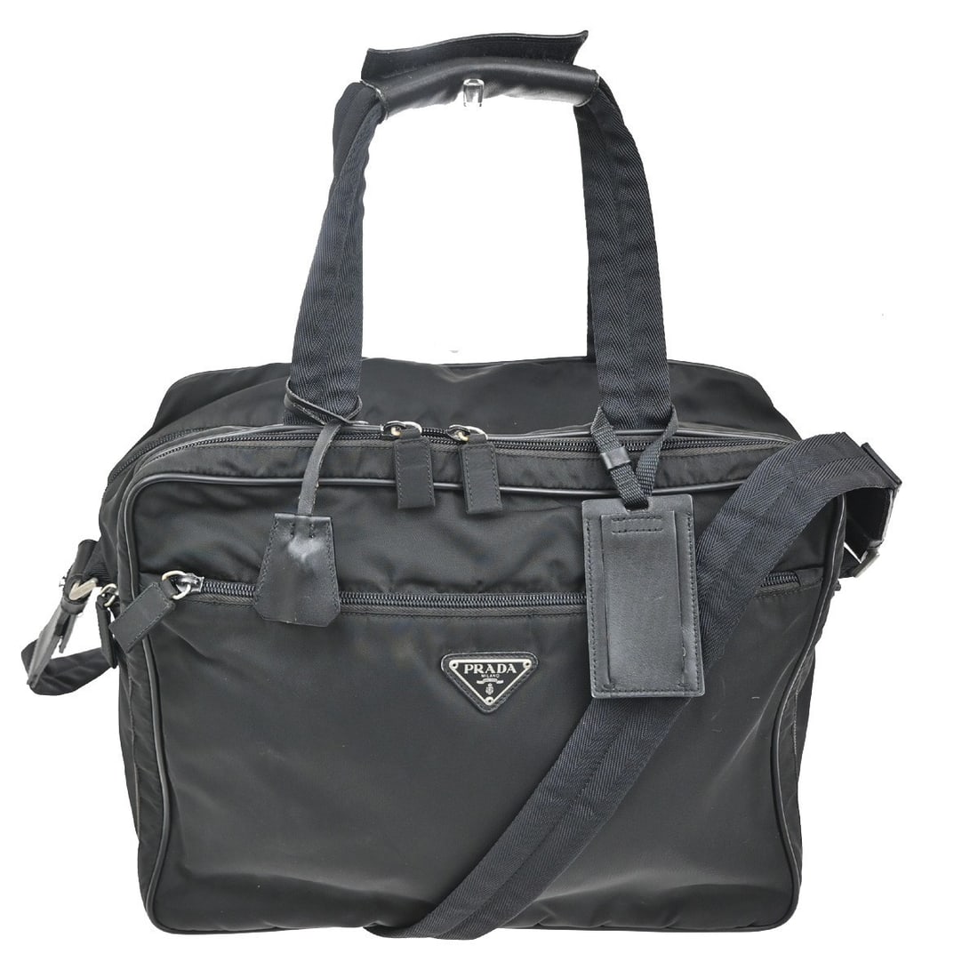 Prada Tessuto Expandable Boston Bag with Front Zip in Black Nylon: Prada Tessuto Expandable Boston Bag with Front Zip in Black Nylon This Prada Expandable Front Zip Boston Bag is crafted from black nylon and designed for women. Made in Italy, it features an expandabl