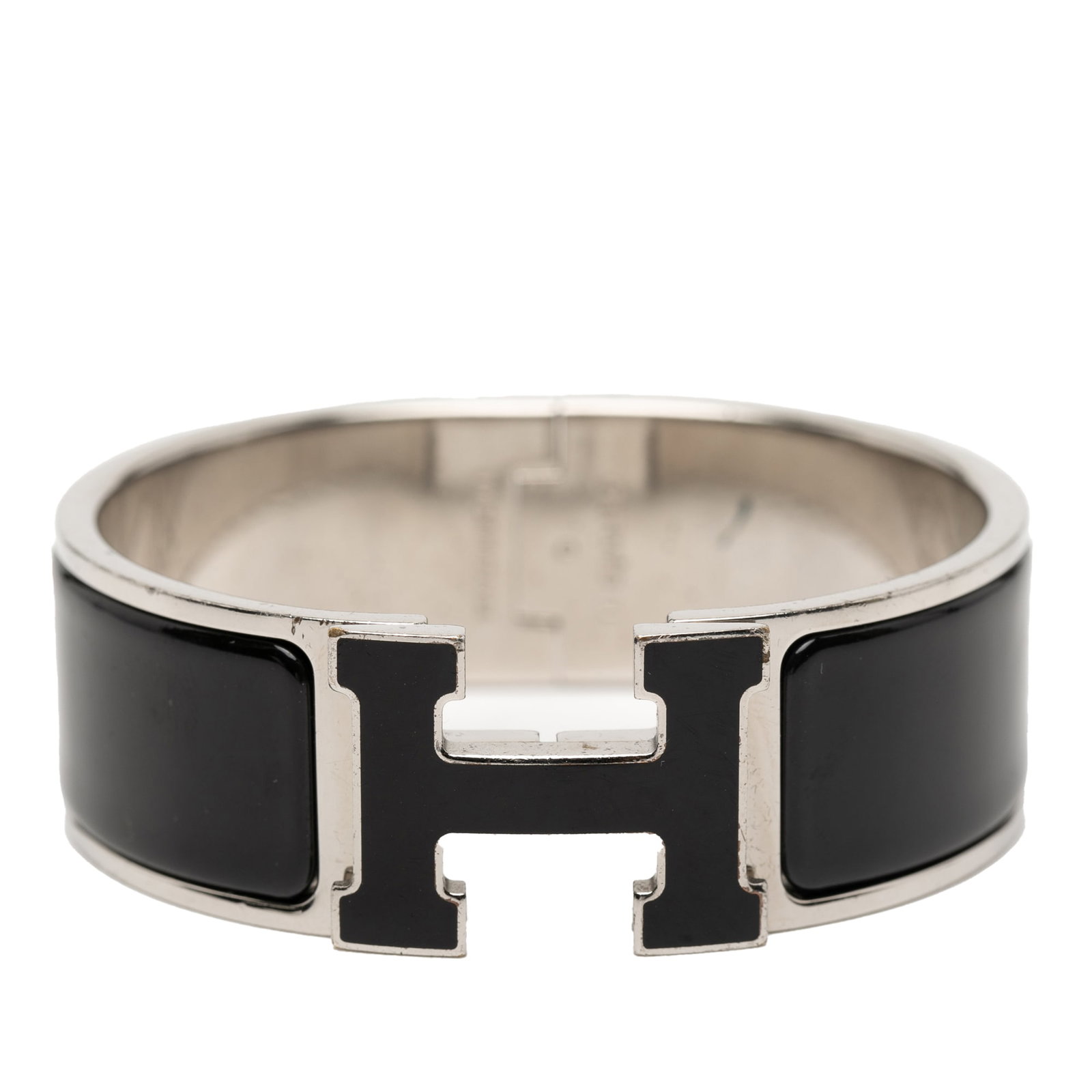 Hermes Black Enamel Clic Clac H Wide PM Bracelet with Palladium Plating: Hermes Black Enamel Clic Clac H Wide PM Bracelet with Palladium Plating This Hermes Wide Enamel Clic Clac H Bracelet PM features a black enamel body with palladium-plated metal accents and an H clasp 