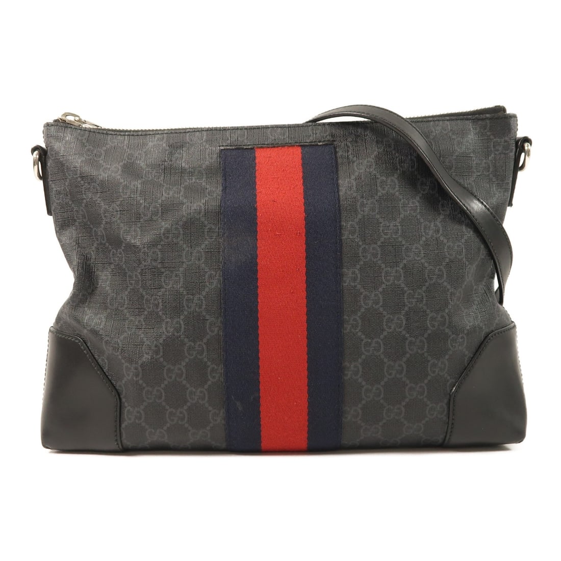 Gucci Black GG Coated Canvas Messenger Bag with Silver Hardware: Gucci Black GG Coated Canvas Messenger Bag with Silver Hardware This GUCCI GG messenger shoulder bag features a sleek black PVC coated canvas exterior, offering durability and a modern look. Designed 