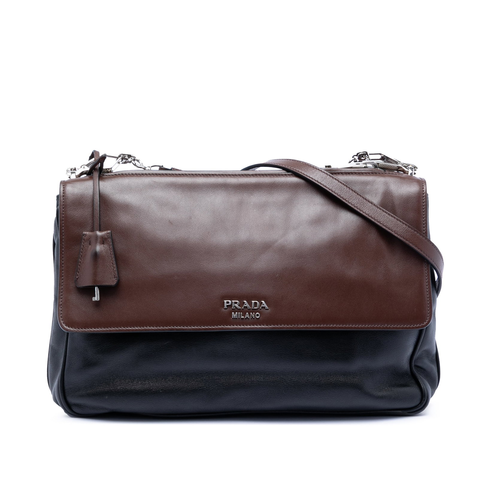 Prada Black Leather Crossbody Messenger with Dual Flap Closures: Prada Black Leather Crossbody Messenger with Dual Flap Closures This Prada Soft Calfskin Double Sided Flap Messenger Bag features a black leather body with an adjustable and detachable flat leather st