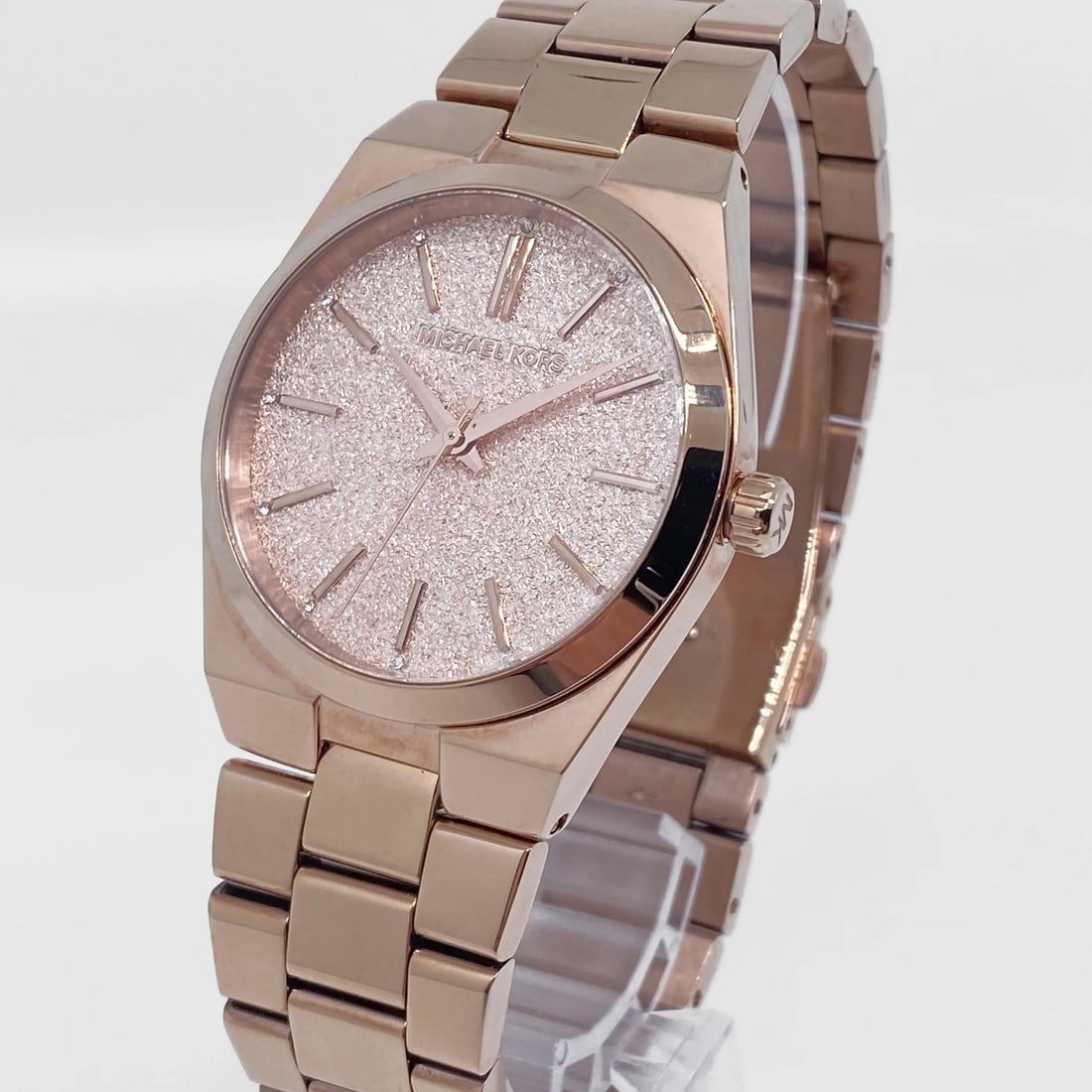 Michael Kors Channing 36mm Rose Gold Quartz Watch MK6624 with Pave Dial: Michael Kors Channing 36mm Rose Gold Quartz Watch MK6624 with Pave Dial Discover the elegance of the Michael Kors Channing 36mm PVD Steel Grain Pave Dial Ladies Quartz Watch MK6624. This exquisite tim
