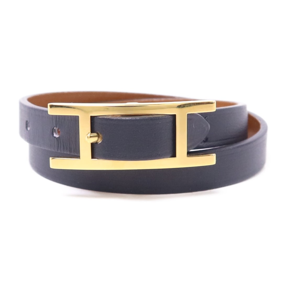 HERMES Behapi Double Tour Bangle Black Calfskin Leather: HERMES Behapi Double Tour Bangle Black Calfskin Leather Introducing the HERMES Behapi Double Tour Bangle, a stunning accessory crafted from luxurious calfskin leather in a classic black hue. This eleg