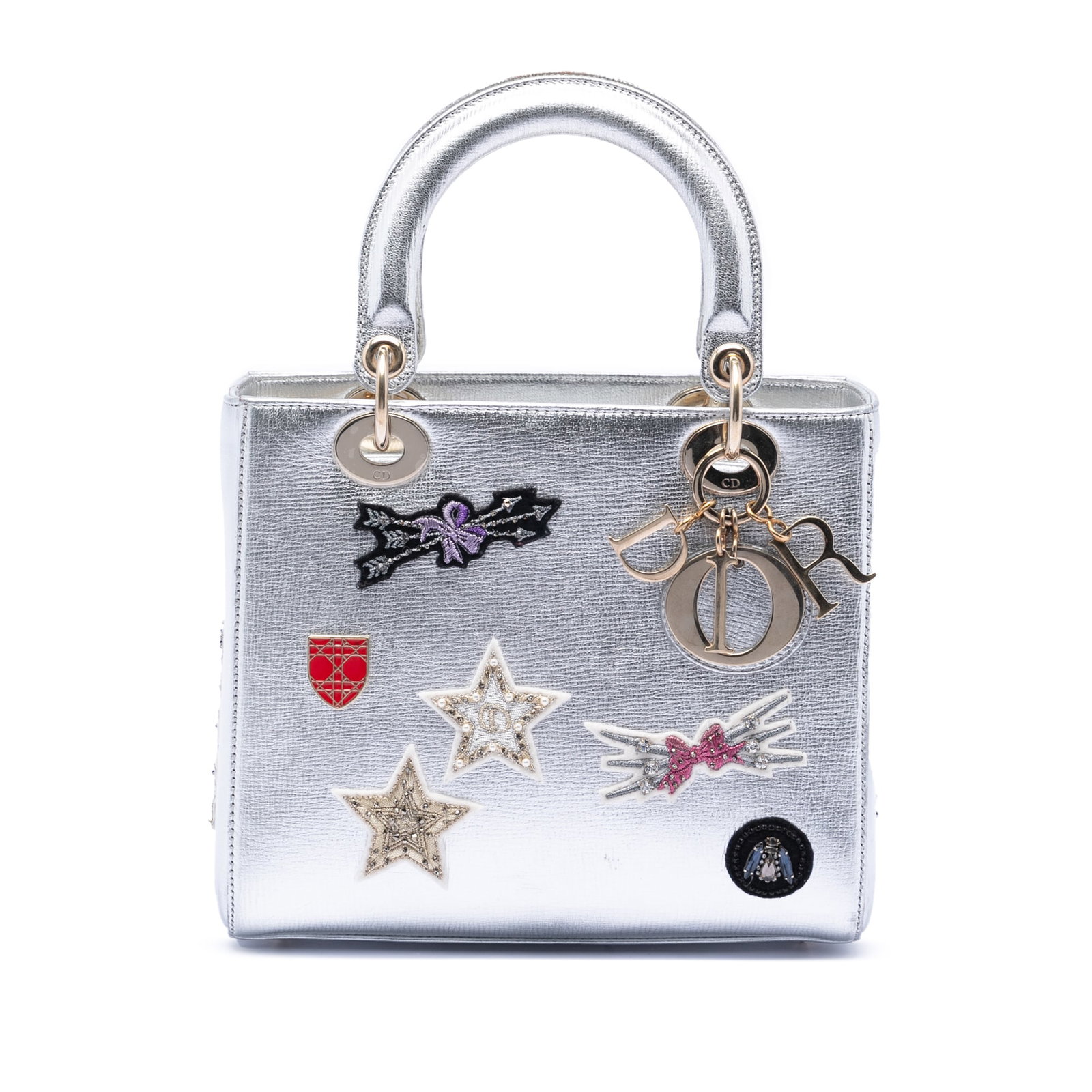 Dior Lady Dior Medium Leather Bag with Patch Accents: Dior Lady Dior Medium Leather Bag with Patch Accents This Lady Dior handbag features a leather exterior with patch embellishments, flat leather top handles, a top zip closure, and an interior zip pock