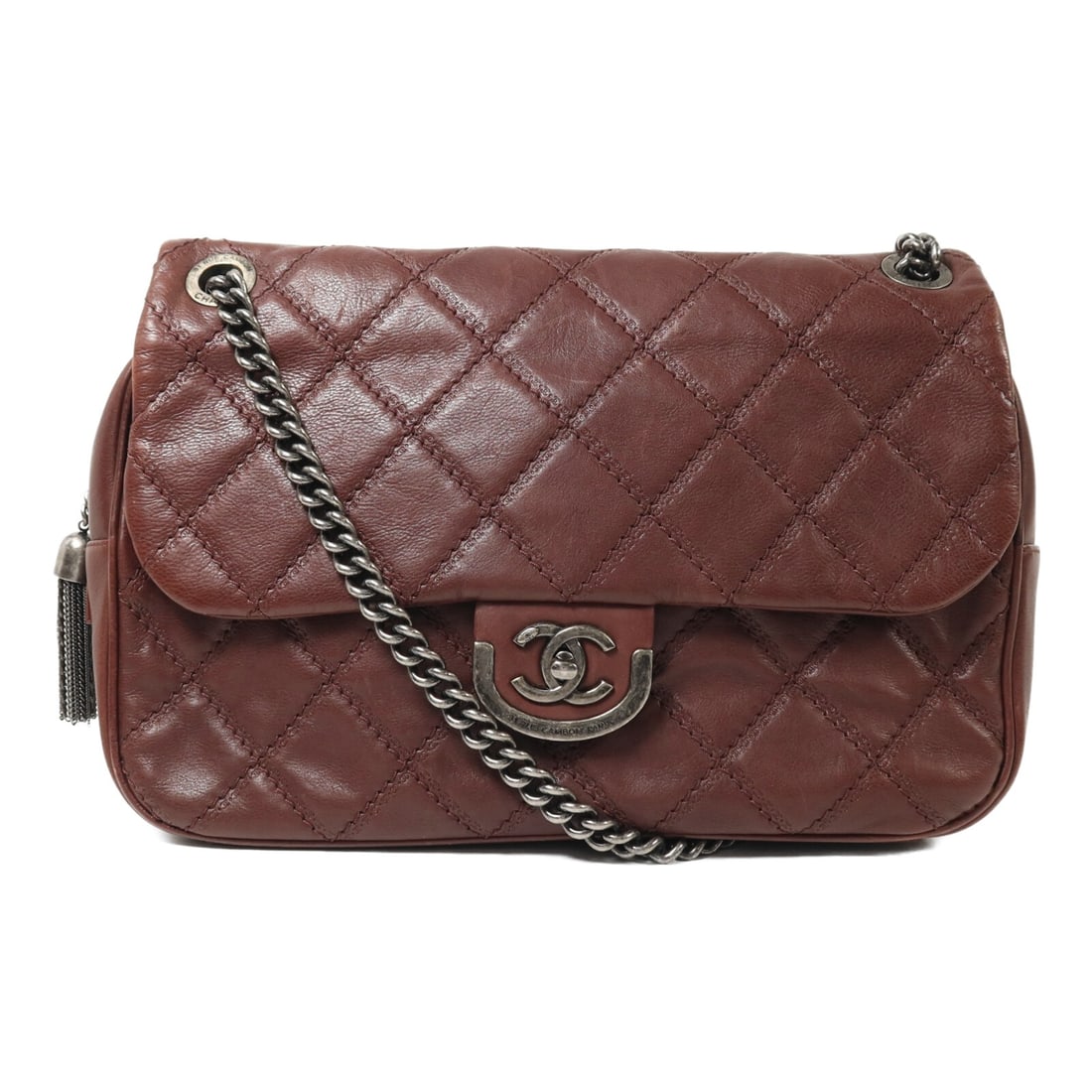 Brown Calfskin Leather Shoulder Bag by CHANEL with Silver Chain: Brown Calfskin Leather Shoulder Bag by CHANEL with Silver Chain This CHANEL shoulder bag features a brown calfskin leather exterior and a classic chain design. Manufactured in France, it combines eleg