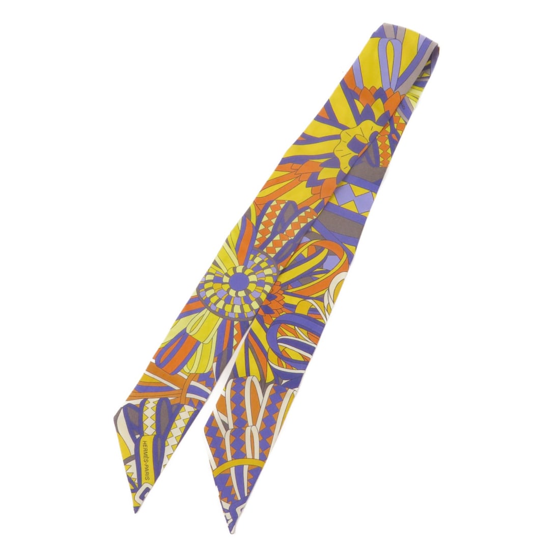 Hermes Silk Twilly Multicolor Women's Scarf: Hermes Silk Twilly Multicolor Women's Scarf This Hermes Twilly scarf is crafted from luxurious silk and features a vibrant multicolor design. Made in France, it is designed for women and offers a styl
