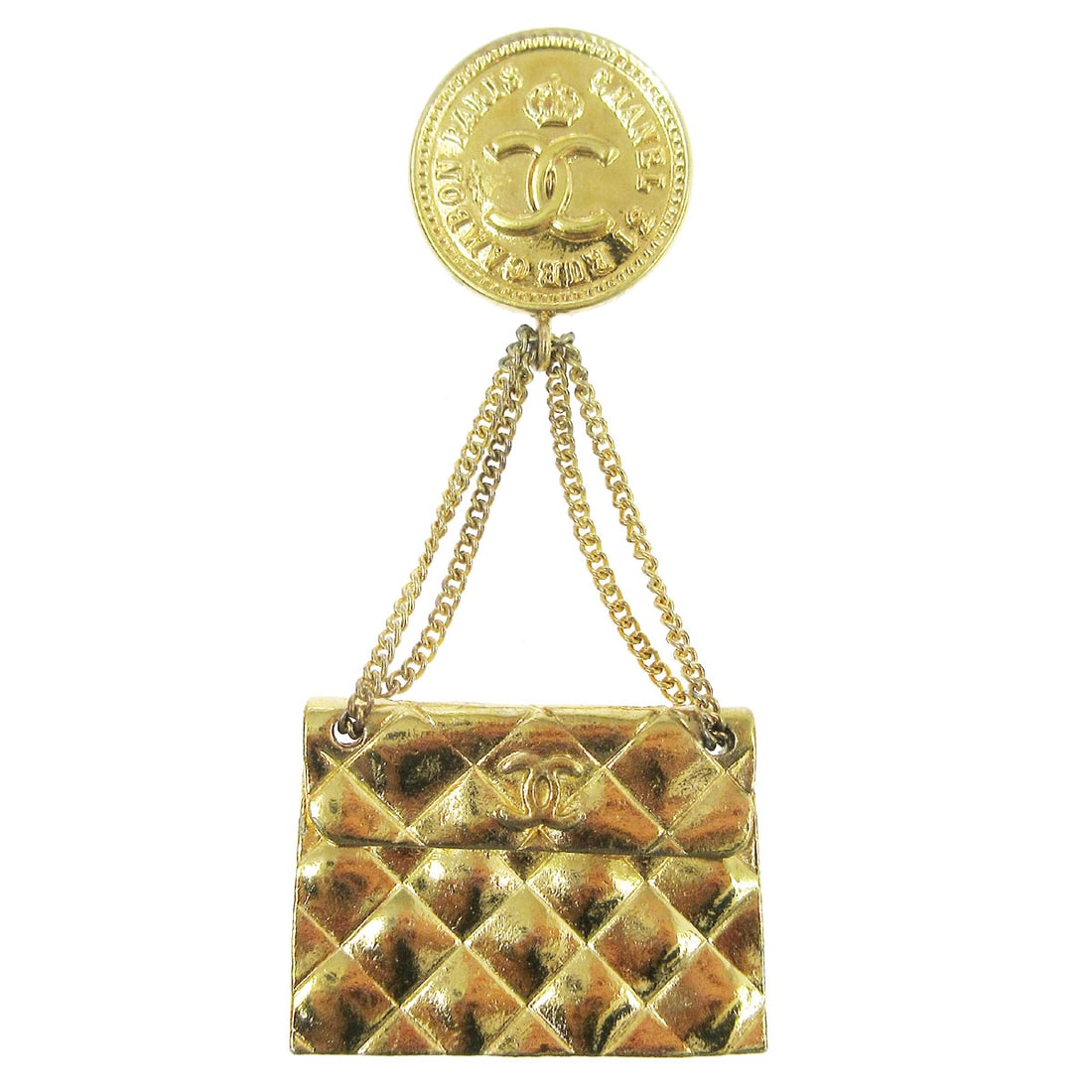 Chanel Gold-tone Bag Brooch Pin Elegant Accessory: Chanel Gold-tone Bag Brooch Pin Elegant Accessory This exquisite Chanel bag brooch pin is crafted in a luxurious gold-tone metal, embodying elegance and style. Designed with a bag theme, this pin is p