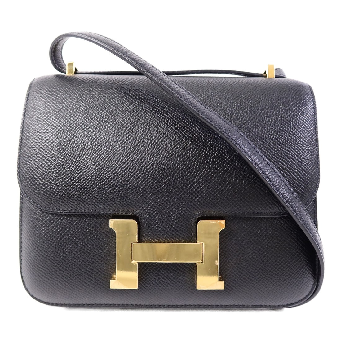Hermes Mini Constance Epsom Leather Black Shoulder Bag GHW: Hermes Mini Constance Epsom Leather Black Shoulder Bag GHW This Hermes Mini Constance shoulder bag is crafted from black Epsom calfskin leather, offering a refined and elegant look. Designed for women