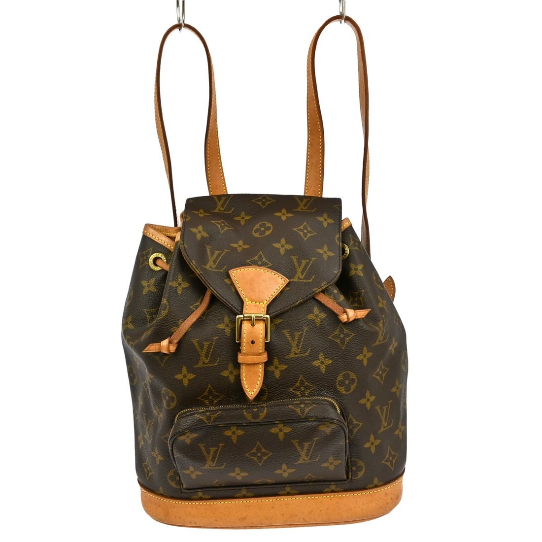 Montsouris Brown Canvas Backpack by Louis Vuitton 25cm by 28cm by 12cm: Montsouris Brown Canvas Backpack by Louis Vuitton 25cm by 28cm by 12cm This Louis Vuitton Montsouris Backpack for women features the classic brown monogram canvas. It shows signs of use with scuffs, s